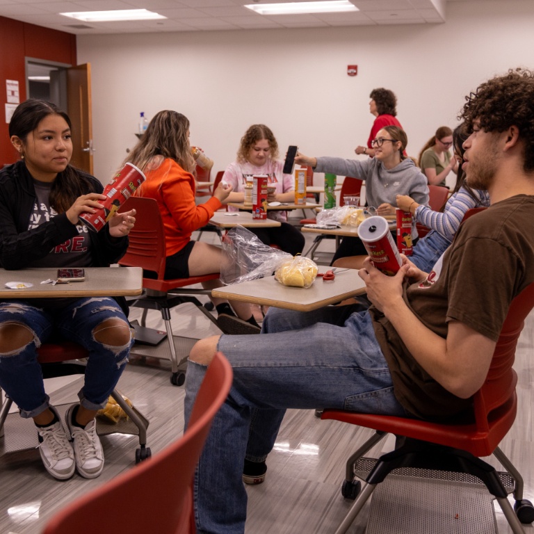 Students eating lunch at their desks.